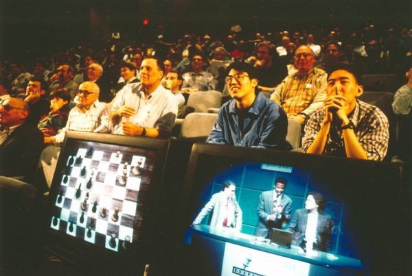 Rapt audience members follow closely at the Deep Blue vs. Kasparov re-match in New York City, New York