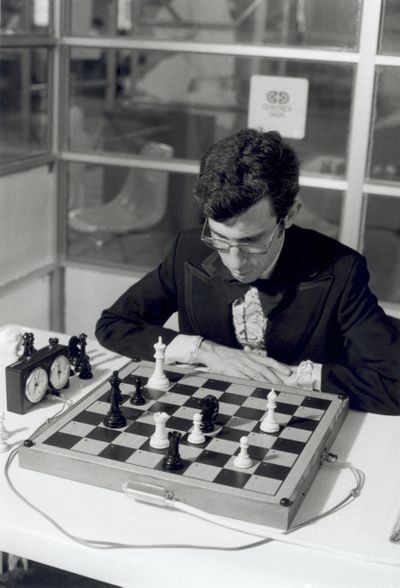 International Master David Levy ponders next move against CHESS 4.6 running on a CDC Cyber 176 supercomputer in Toronto