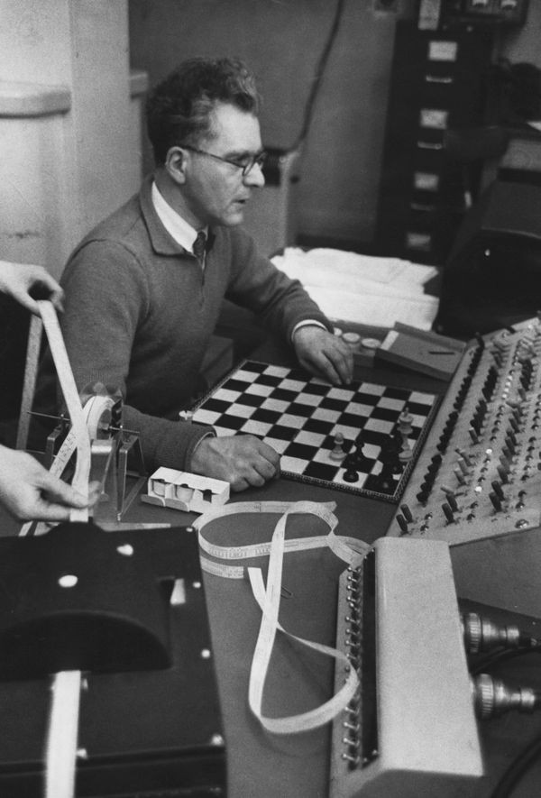 Dr. Dietrich Prinz loading chess program into a Ferranti Mark I computer
