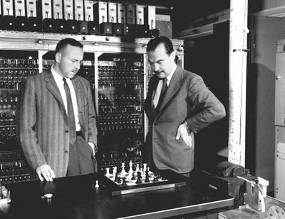 Los Alamos scientisits Paul Stern (left) and Nick Metropolis playing chess with the MANIAC computer
