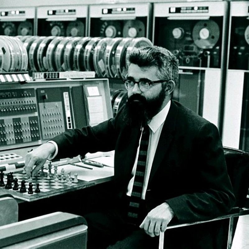 John McCarthy, artificial intelligence and timesharing pioneer, playing chess at Stanford's IBM 7090