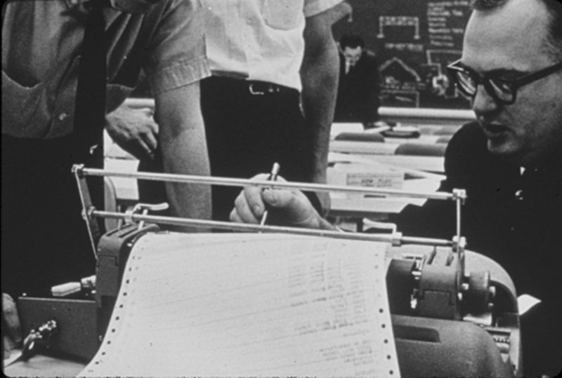  Students interacting with the PDP-1 via its Soroban console typewriter