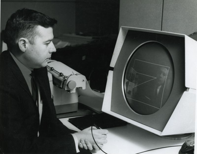 User interacting with an early Computer Aided Design (CAD) program running on a PDP-1 computer
