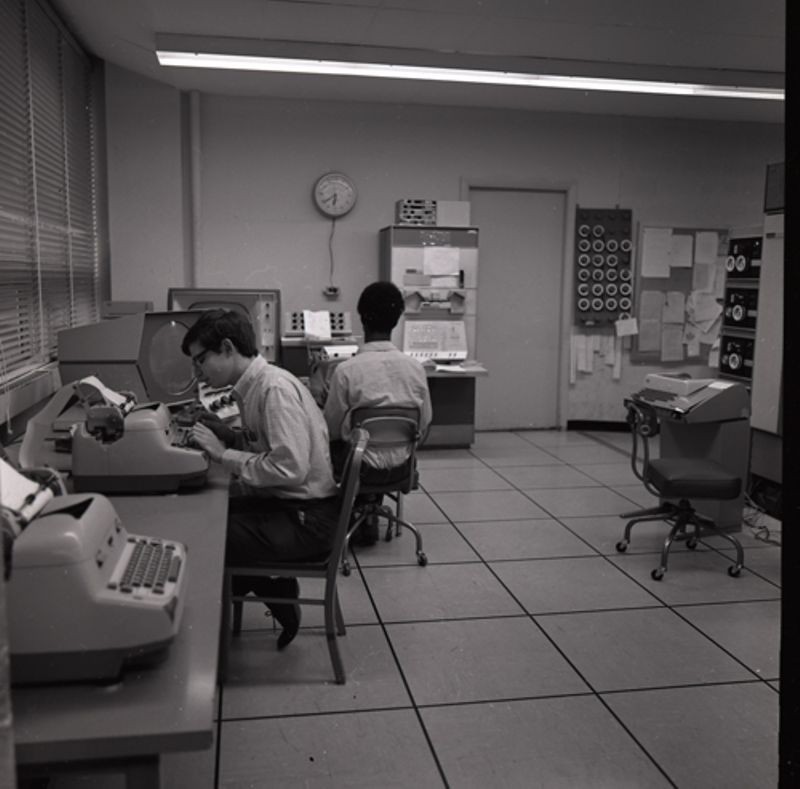 Two men at PDP-1 at MIT