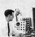 Max Palevsky (standing) and Robert Beck, in the lab