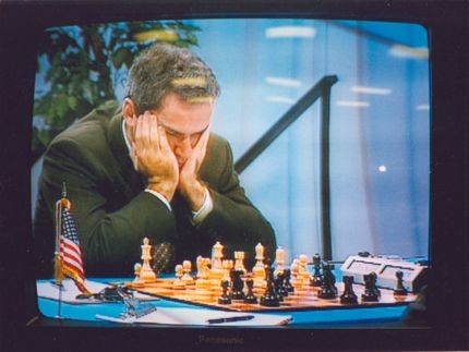 Garry Kasparov focuses intensely on his position in Game 6 of the Deep Blue vs Kasparov match in Philadelphia, Pennsylvania