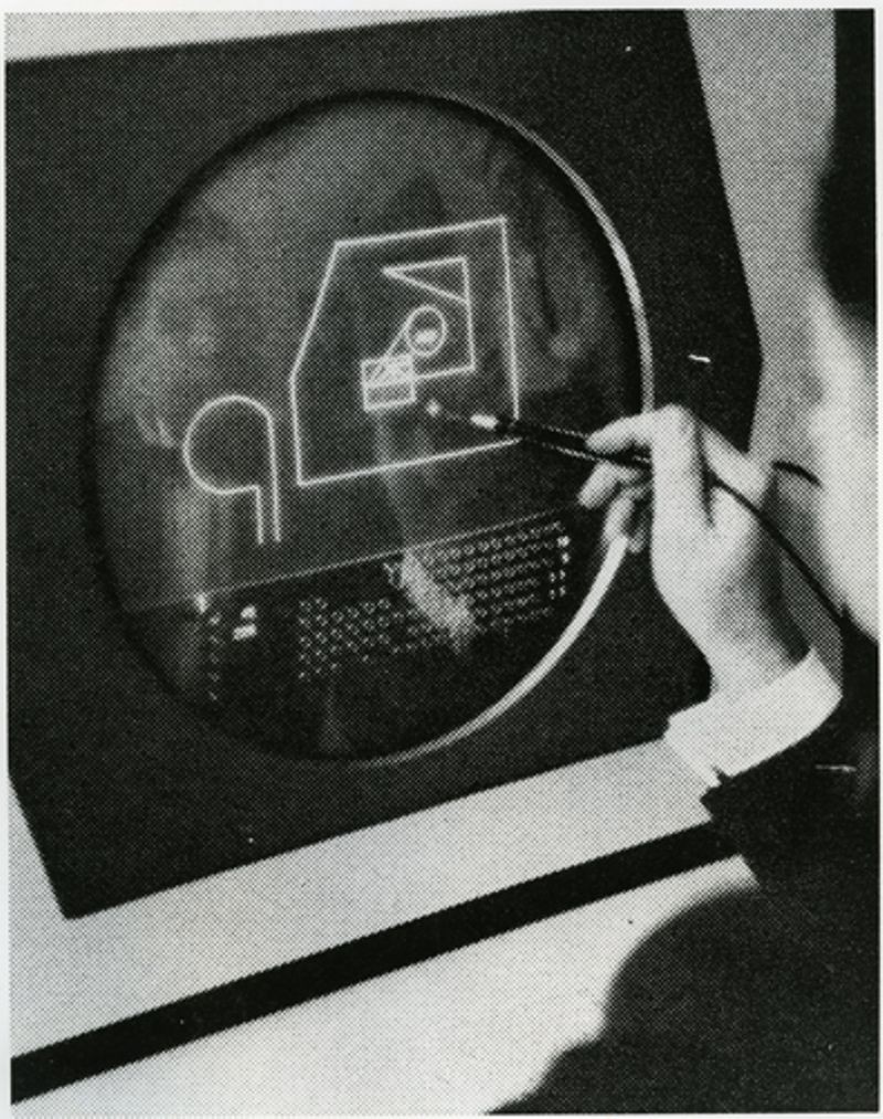 User interacting with an early Computer Aided Design (CAD) program running on a PDP-1 computer